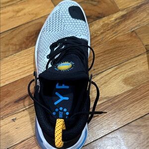 Nike Black and White Sneakers with Blue Accents